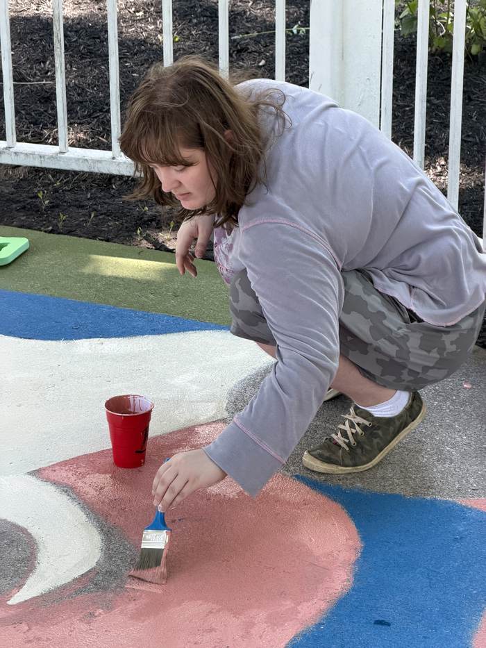Hand-painting the pink sections
